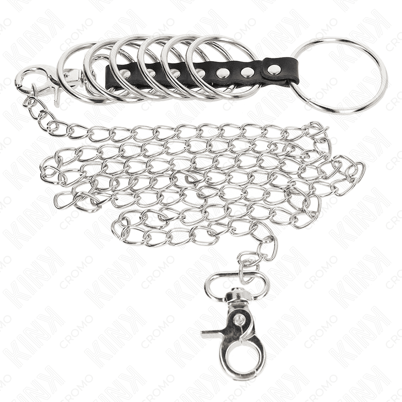 KINK - 7 METAL PENIS RINGS 3.8 CM TO 5 CM CONNECTED WITH LEATHER AND METAL CHAIN 100 CM 5